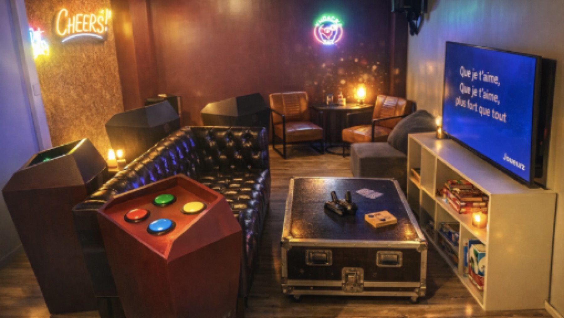 Le salon du Lounge Game : canapé Chesterfield, buzzers, écran de karaoké